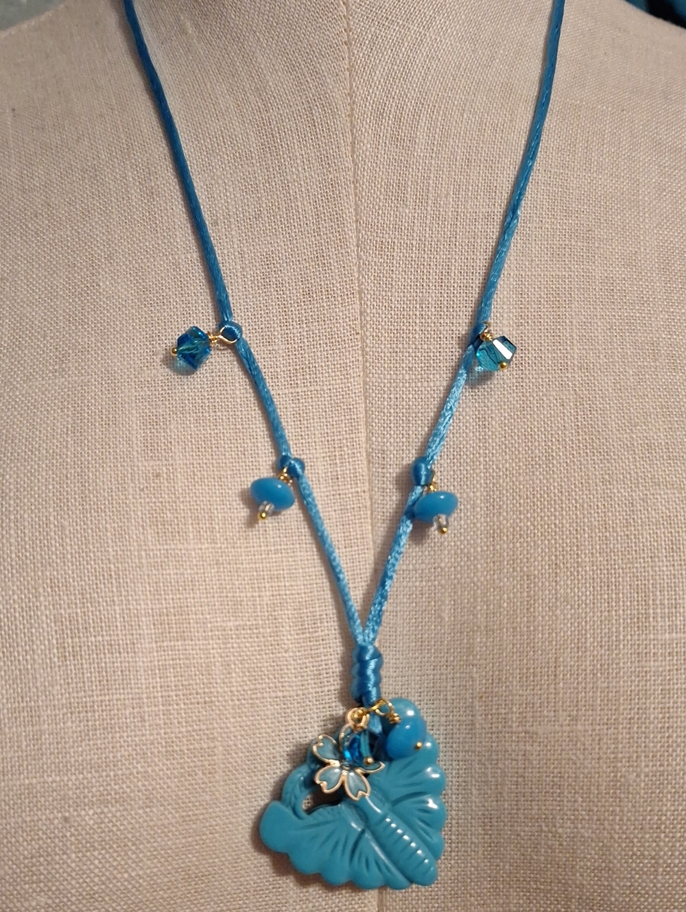 Blue Moth Pendant Necklace On Silk Cord